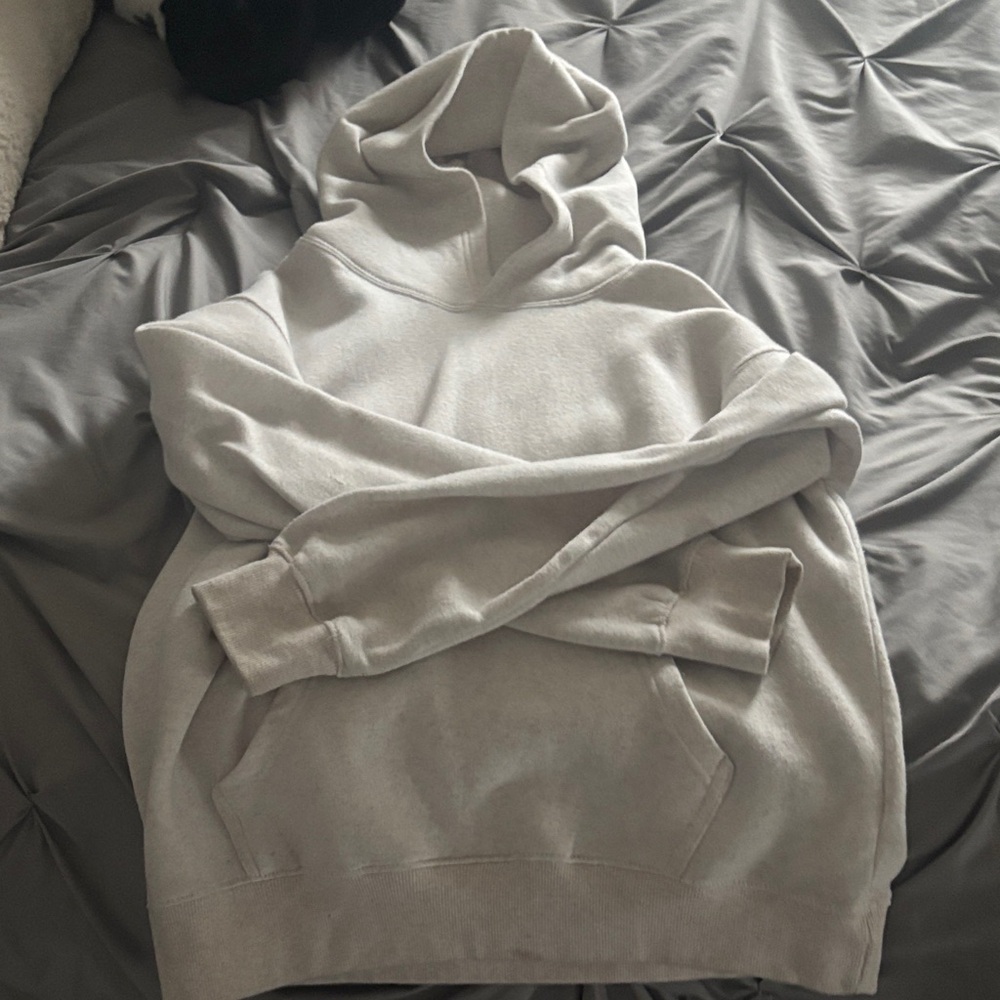 Cream colored hoodie, size medium, great condition